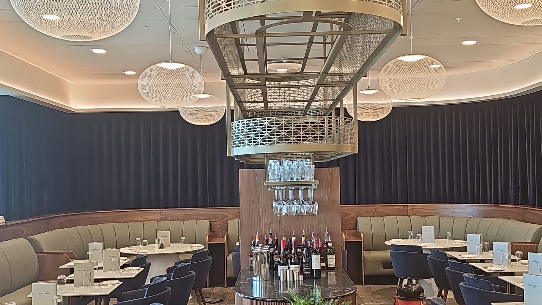 Made-to-measure commercial curtains installed at Manchester Airport lounge